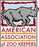 Logo of the American Association of Zoo Keepers featuring a gray rhinoceros above the organization's name in bold red and orange letters, perfect for inclusion in any Central Florida Animal Reserve media kit.